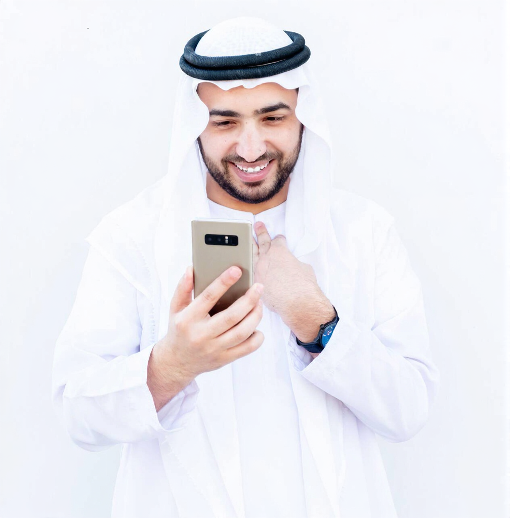 Muslim man using his phone